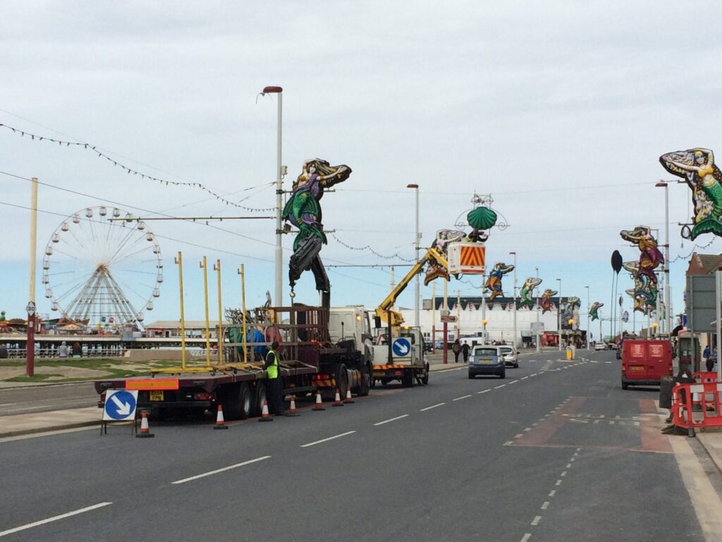 Installing the Illuminations on Blackpool promenade which are made at Lightworks